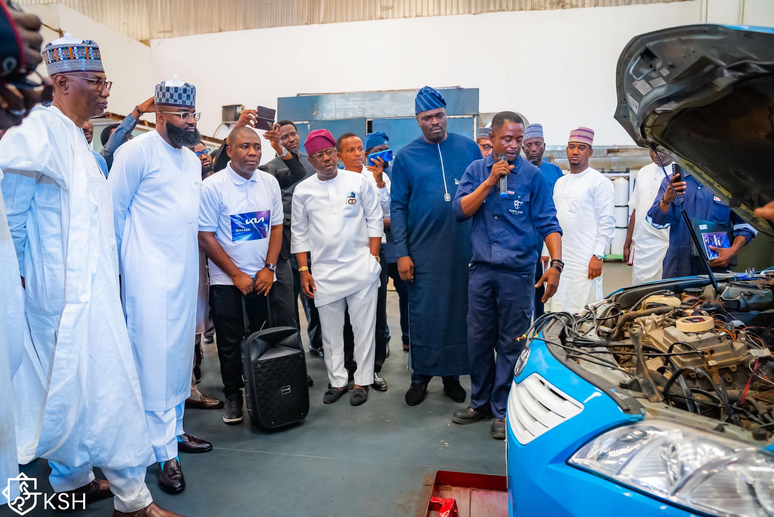 L-R: Director-General, Federal Radio Corporation of Nigeria (FRCN), Dr Bulama Muhammad; Executive Vice Chairman/CEO of National Agency for Science and Engineering Infrastructure (NASENI), Khalil Suleiman Halilu; CEO of Portland Gas Limited, Mr. Folajimi Mohammed (4th right) and Program Director, Presidential Initiative on Compressed Natural Gas (Pi-CNG). Engr. Michael Oluwagbemi inspecting a CNG vehicle during the launch of PI-CNG’s Ride-Share CNG Conversion Incentive Program and My-CNG App at the NASENI-Portland Conversion Centre, Utako , Abuja , on Friday , August 9, 2024.